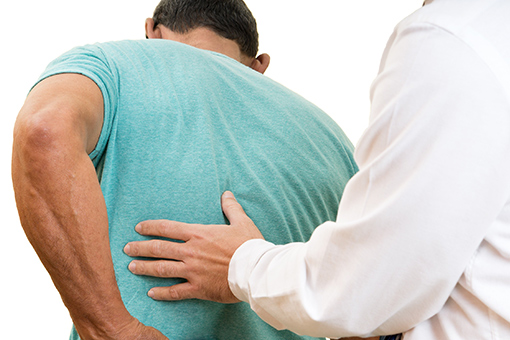 Chiropractor in Tolleson Arizona Treating Phoenix Man Suffering from Back Pain