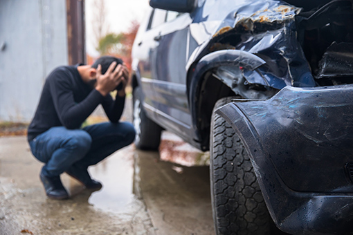 Frustrated Man Involved in a Motor Vehicle Accident Thinking of Chiropractors in Tolleson AZ