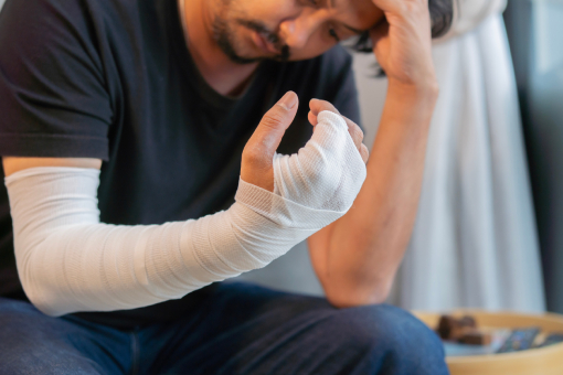 Guy With Hand Injury Thinking of Visiting Personal Injury Chiropractor in Tolleson Arizona