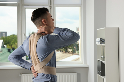 Tolleson Man Suffering From Disc Injuries Wearing Back Brace Without Consulting Chiropractor