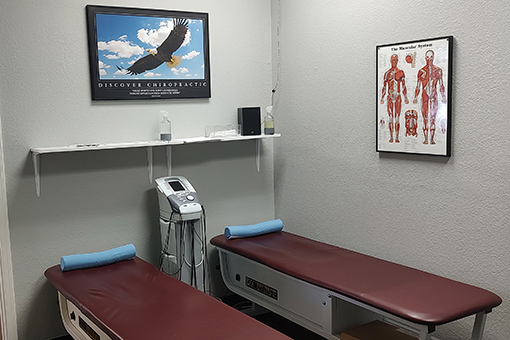 Two Chiropractic Beds at a Clinic in Phoenix AZ Offering Slip and Fall Injury Treatment Services